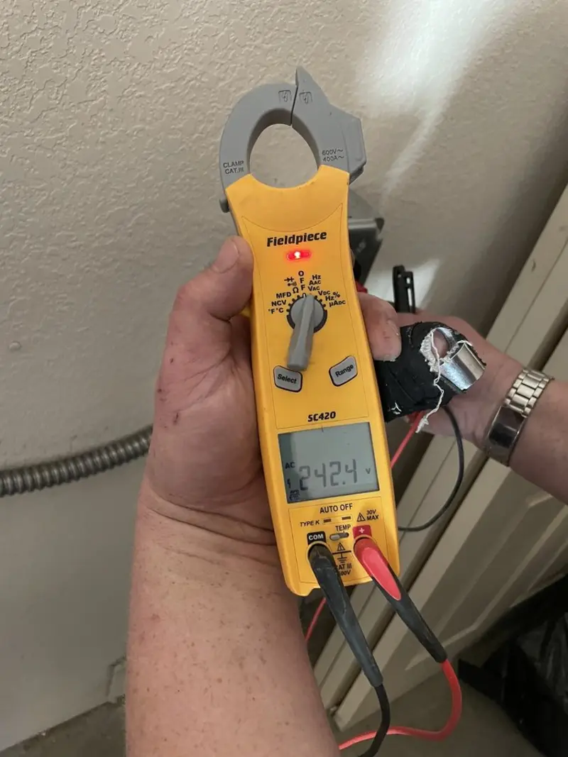 Voltage testing with clamp meter during Generator Installation in Elyria